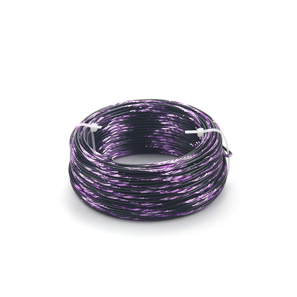 A coil of purple and silver flexible aluminum craft wire for jewelry making and DIY projects.