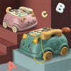 A pink and teal toy car shaped like a cat, featuring musical phone elements for toddlers.