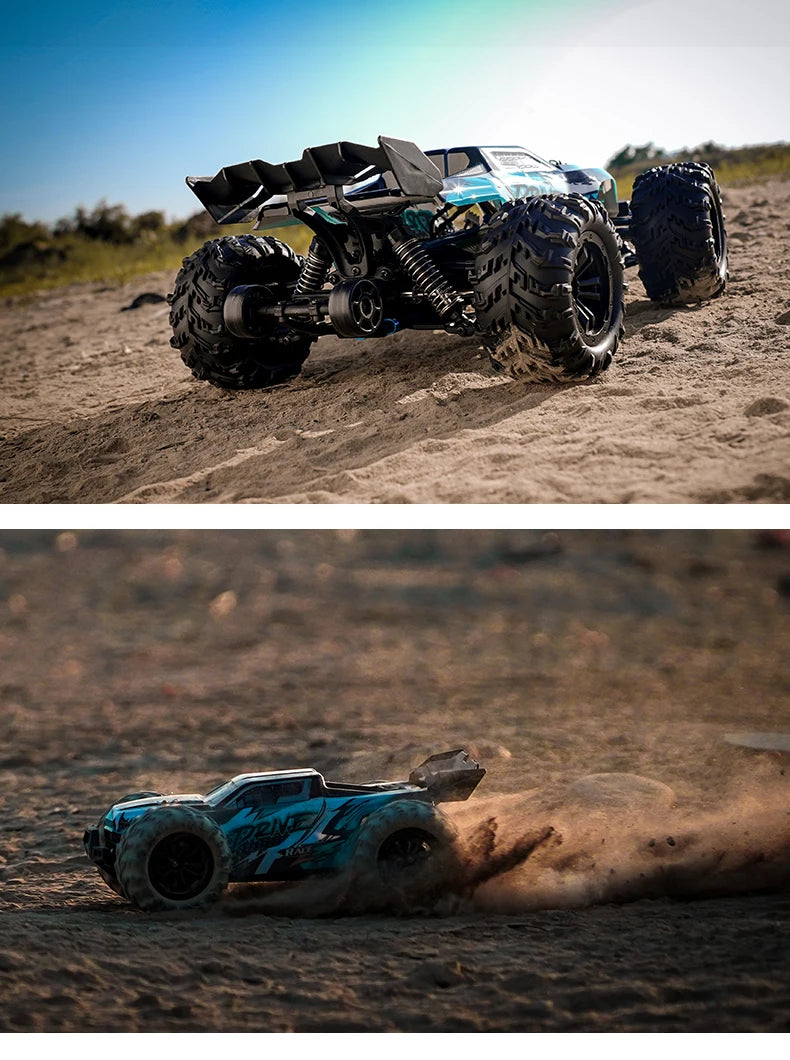 A blue brushless 4WD monster truck RC car with LED headlights driving on a sandy terrain.