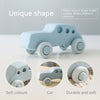 A light blue silicone toy car with unique shape, demonstrating soft colors, durability, and a car design for toddlers.