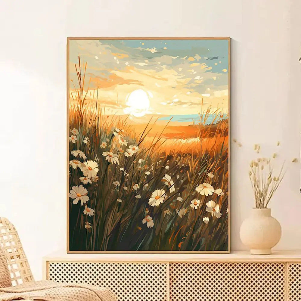 A painting of a sunset over tall grass with wildflowers, featuring warm orange and yellow tones.
