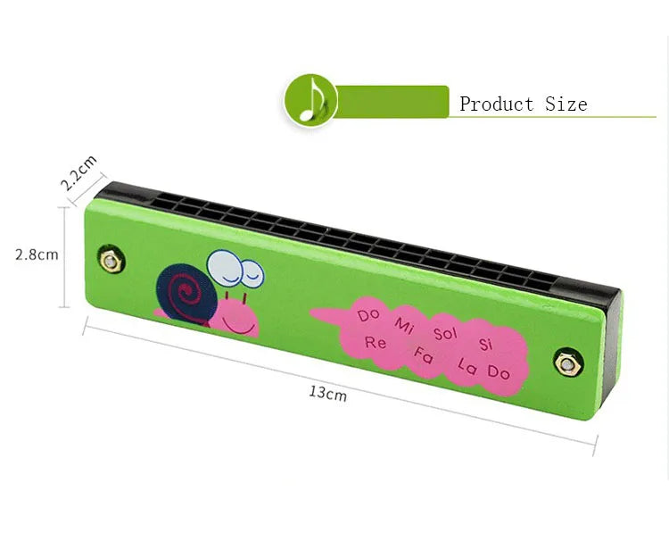 A green wooden harmonica with a cartoon animal design showing musical notes on the body.