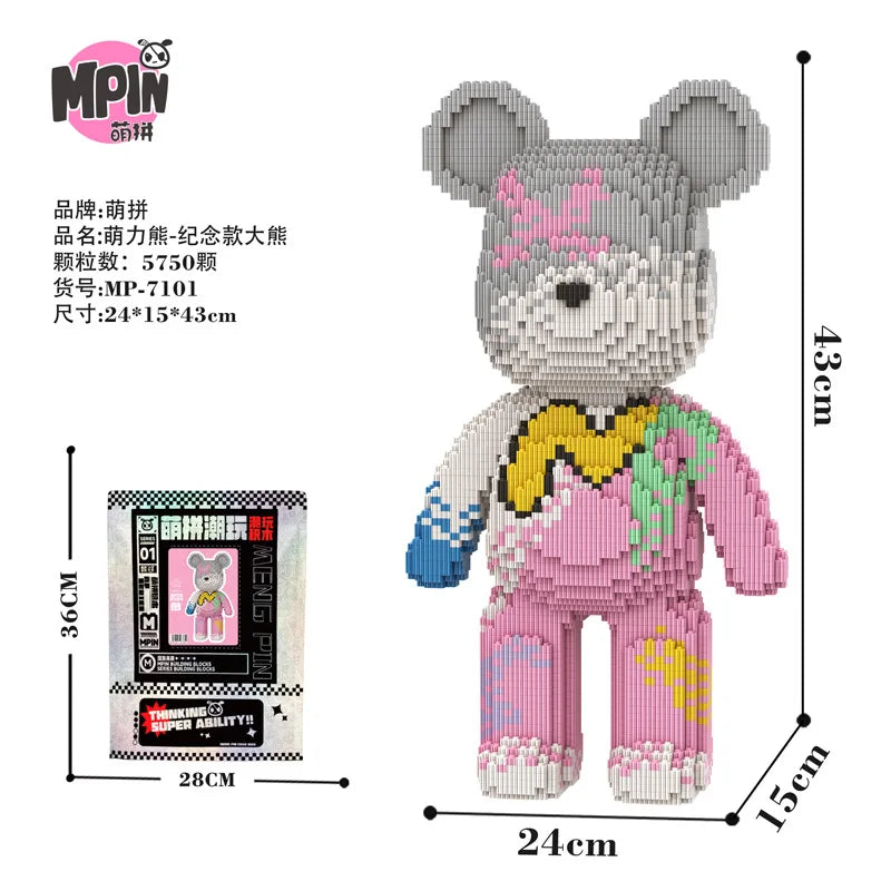 A pink bear figure made of micro building blocks, packaged with instructions and accessories.