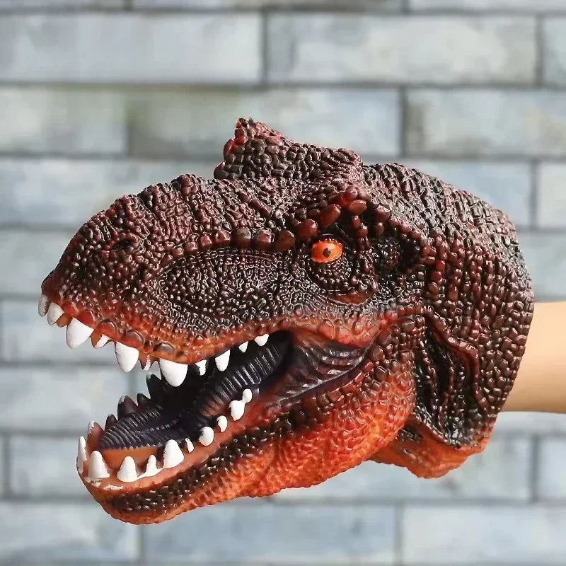 A realistic brown T-Rex dinosaur hand puppet with sharp teeth and textured skin.