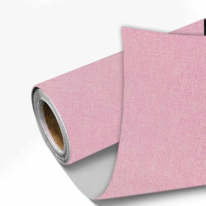 Pink linen book binding cloth rolled and stacked for albums and scrapbooks