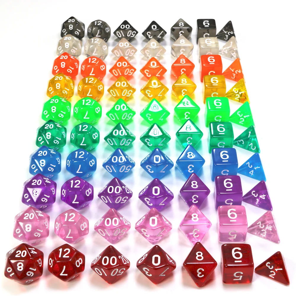 A collection of acrylic dice in various colors and shapes arranged in a grid.