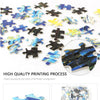A close-up of many small jigsaw puzzle pieces in various colors, demonstrating high precision cutting and occlusion.