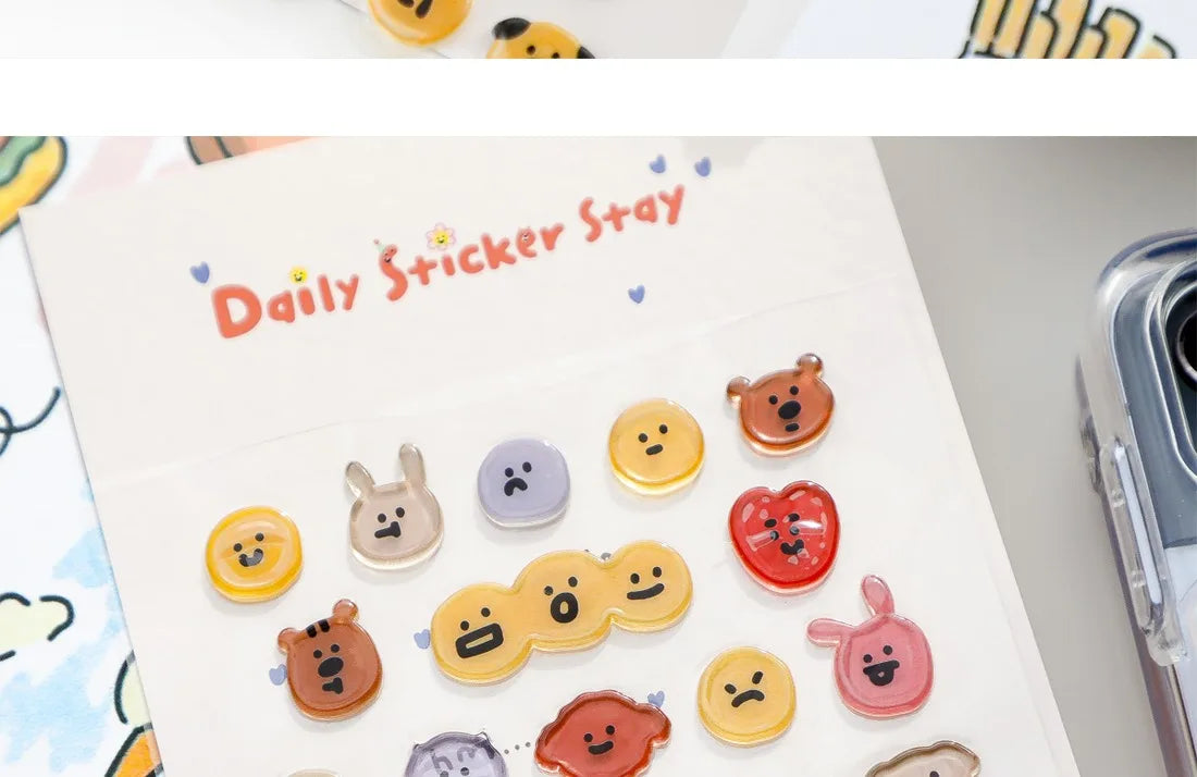 A collection of 3D smile face crystal stickers in various colors and expressions for crafting and decorating.