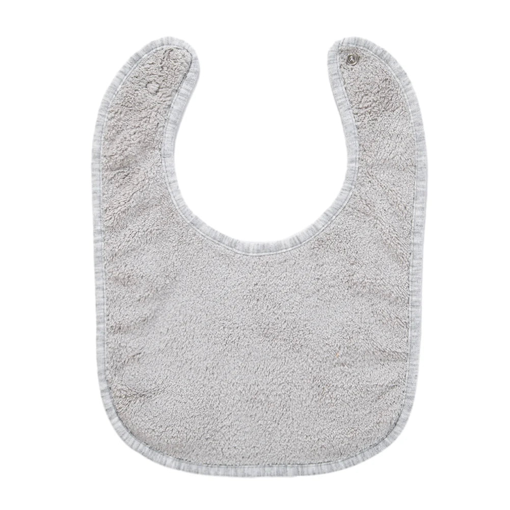 A light gray, soft cotton baby bib with a rounded shape and adjustable snap closure.
