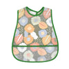 A baby bib with a watercolor cartoon pattern featuring various floral shapes in shades of orange, blue, and green.