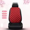 A black car seat cushion with a red quilted cover, featuring features for warmth and comfort.