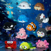 A collection of colorful penguin and sea animal figures made from 3D construction bricks floating in water.