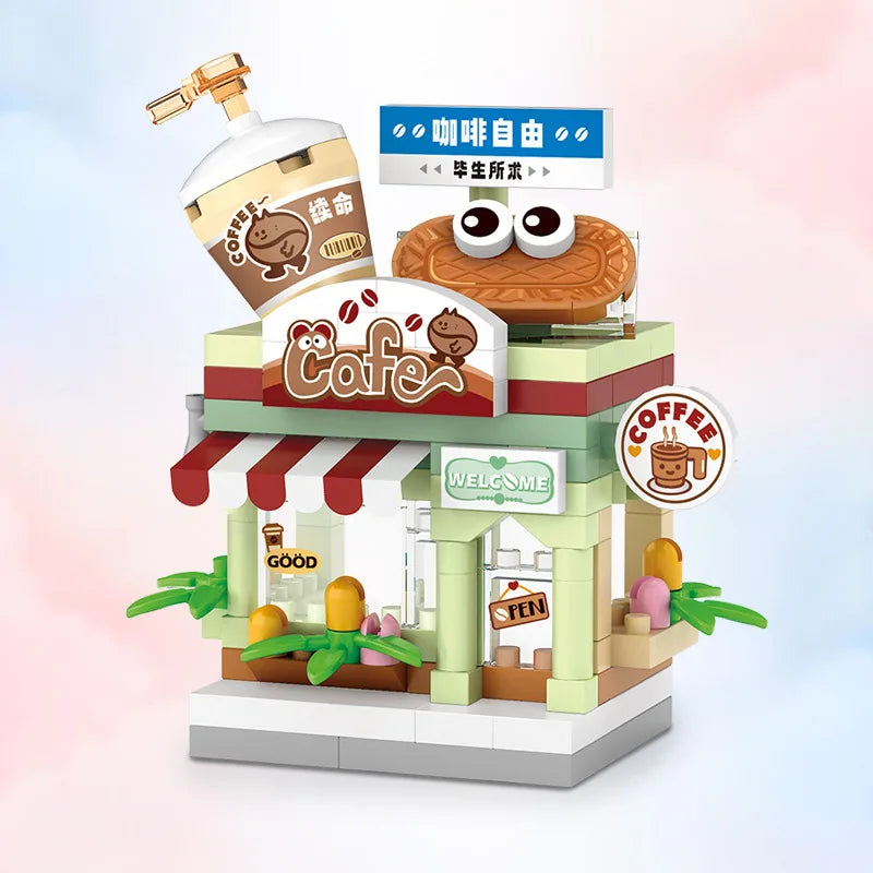 A miniature city shop building block set featuring a coffee cafe storefront with signage and outdoor seating.