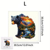 A wooden jigsaw puzzle depicting a bear in a forest landscape with vibrant colors.