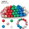 A collection of 50 silicone floral beads in various colors including red, green, blue, and white.