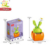 A set of orange and green building blocks for a flower succulent decoration featuring a plant and a decorative top.
