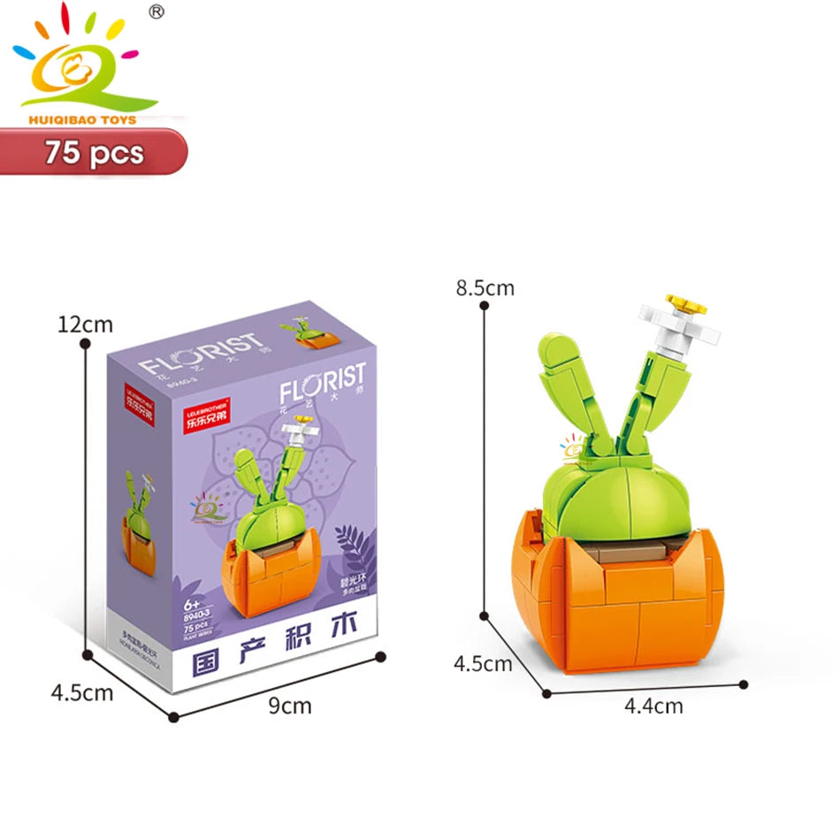 A set of orange and green building blocks for a flower succulent decoration featuring a plant and a decorative top.