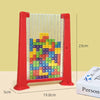 A vertical wooden puzzle board with colorful building blocks used for creative play.