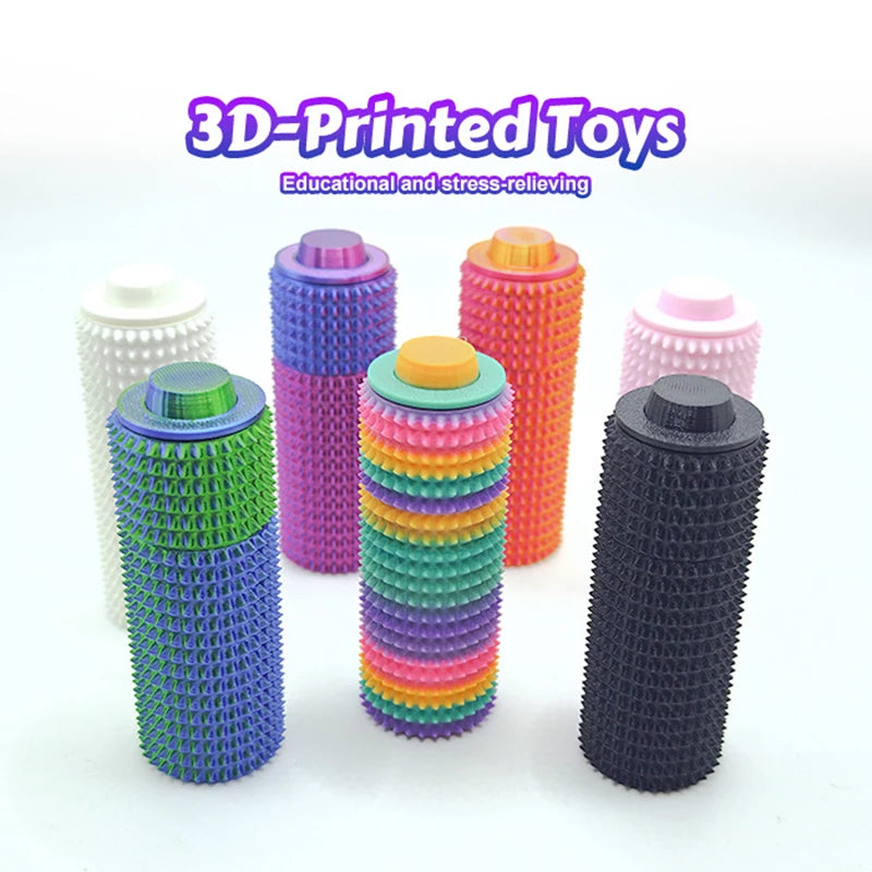 Collection de rouleaux anti-stress tactiles imprimés en 3D, dans diverses couleurs (violet, rose, vert et noir).
