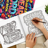 A hand is drawing on a coloring page featuring a title and stars, next to an open book with colorful graffiti patterns.