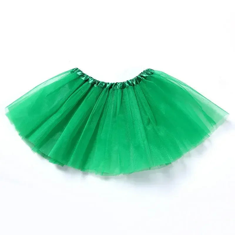 A vibrant green three-layer tutu skirt for girls displayed against a white background.