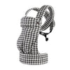 A black and white houndstooth patterned adjustable cotton baby carrier wrap for newborns and toddlers.
