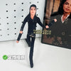 A black stuffed doll plushie inspired by Michael Jackson, standing upright against a white background.