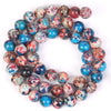 A circular arrangement of natural sea sediment jasper and turquoise beads for jewelry making