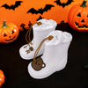 A pair of white waterproof bear rain boots with anti-slip soles displayed against an orange Halloween background.