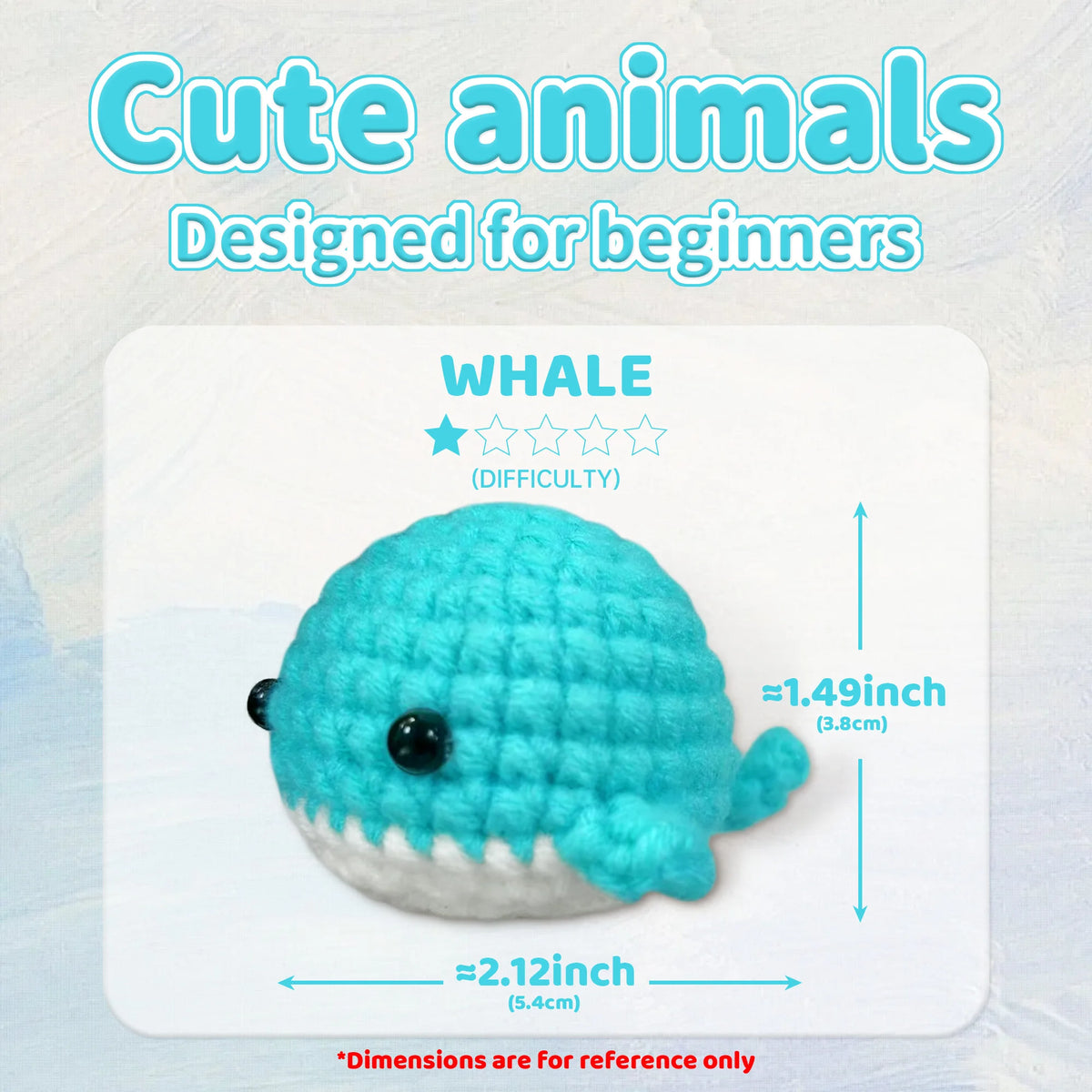 A light blue whale amigurumi crochet project displayed on a white background with difficulty rating and size measurements.