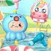 A cute blue animal backpack water gun is spraying water into a pool, with a pink water gun accessory nearby.