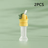 Two pieces of a yellow and green anti-choking straw and bottle cap converter for kids