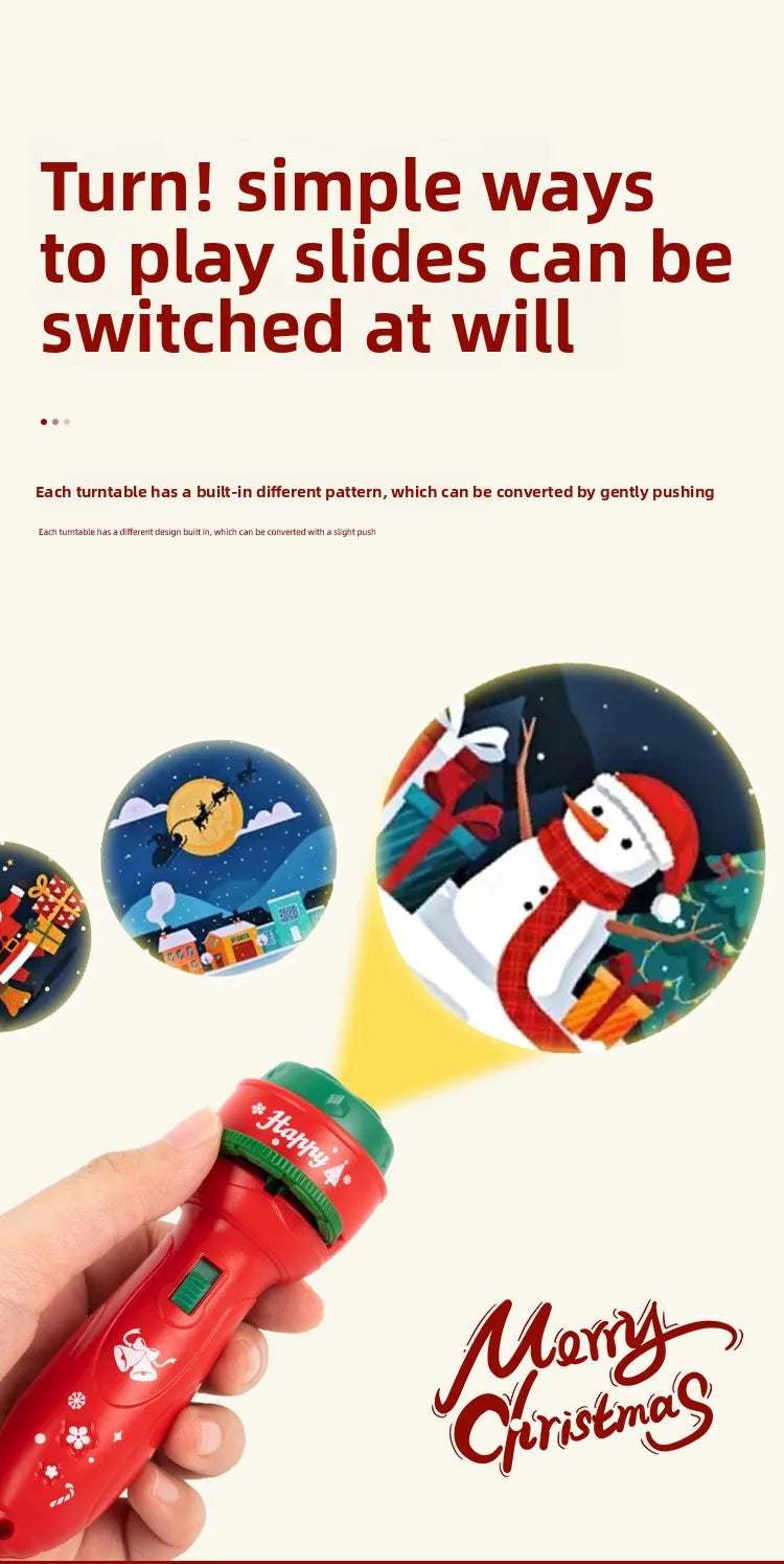 A red Christmas projection flashlight is held in a hand, showing a festive design.