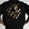 Black graphic cotton t-shirt featuring a gold tiger claw design with the text Never Give Up