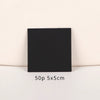 A black square jewelry display card is shown against a light background.
