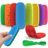 A collection of colorful silicone fidget strips in various shapes and textures, including orange, red, blue, green, yellow, a