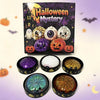 A box of Halloween Mystery squishy fidget toys featuring glitter pumpkins, eyeballs, and skulls, with several loose balls dis
