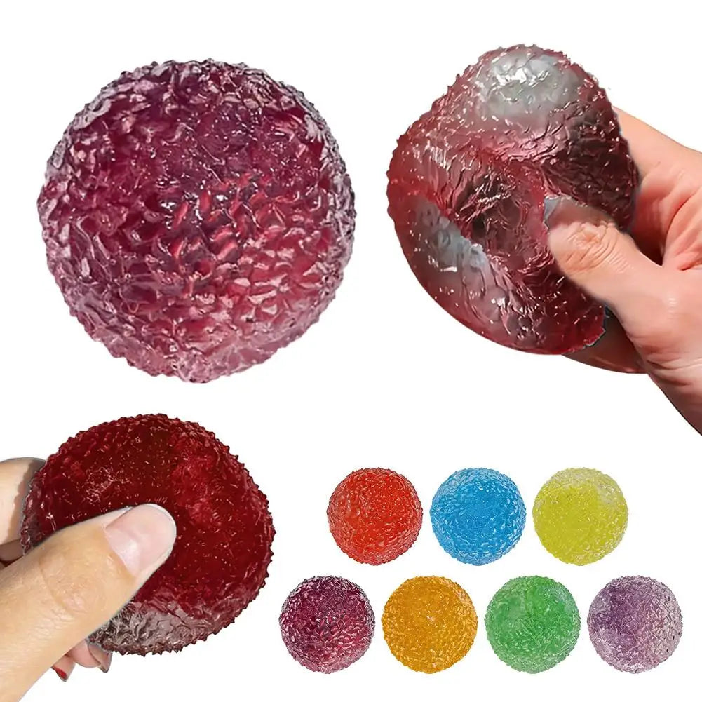 A collection of deep red and purple sensory stress relief fidget balls in various sizes and textures.