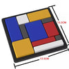 A rectangular puzzle board with nine colored squares, including blue, yellow, red, and white sections.