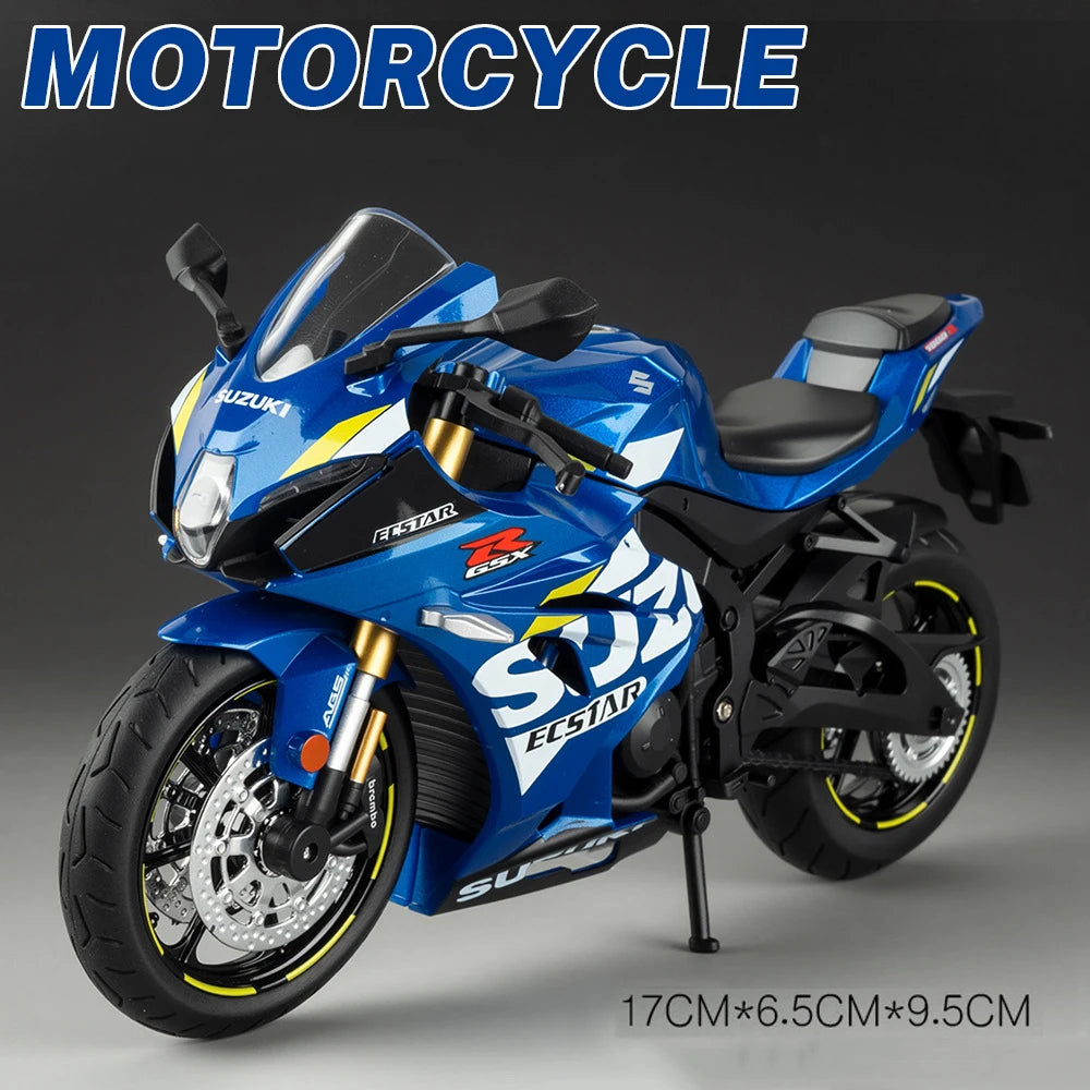 A blue Suzuki ECSTAR diecast motorcycle model with lights and suspension on a display stand.