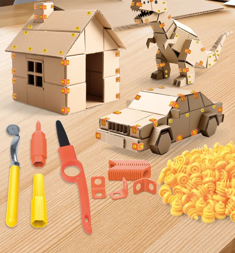 Cardboard construction kit for kids featuring a dinosaur house, tools, and storage box components.