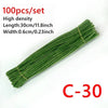A bundle of 100 green chenille craft sticks measuring 30cm long and 0.6cm wide.