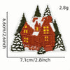 An iron-on patch depicting a festive cartoon character in the shape of a Christmas tree.
