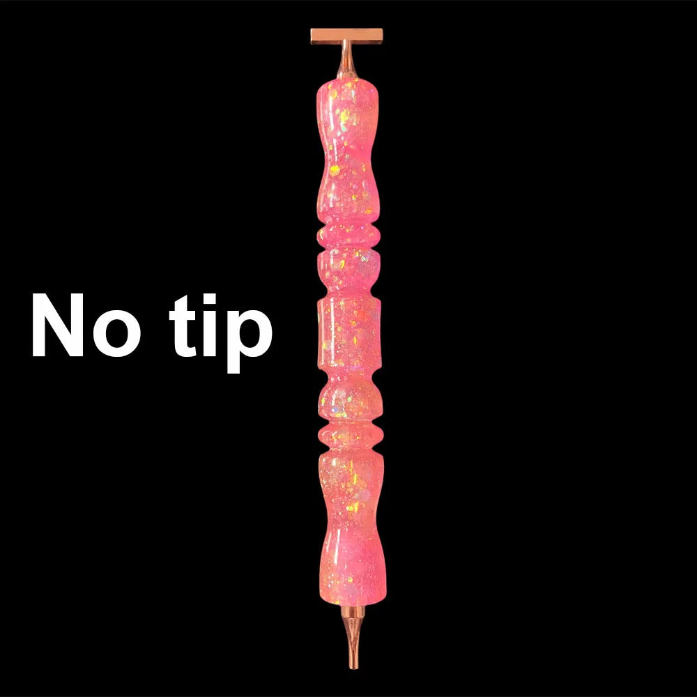A pink glitter resin diamond painting pen with a sparkle wavy handle.