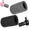 A set of black and pink flocked foam microphone windscreen covers and mounting clips.