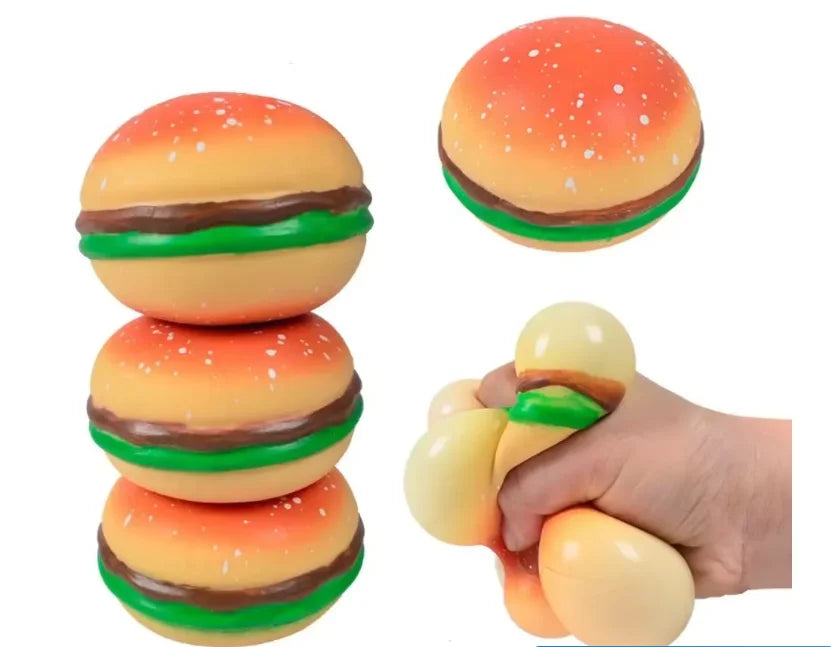 A set of colorful, squishy stress balls shaped like hamburgers in various colors and textures.