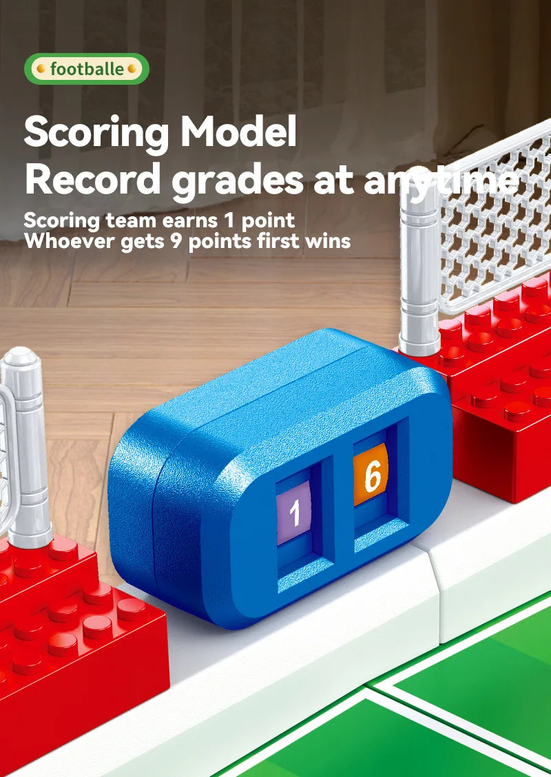A close-up of a scoring model for a tabletop foosball game showing a blue block with the number 1 and an orange block with th