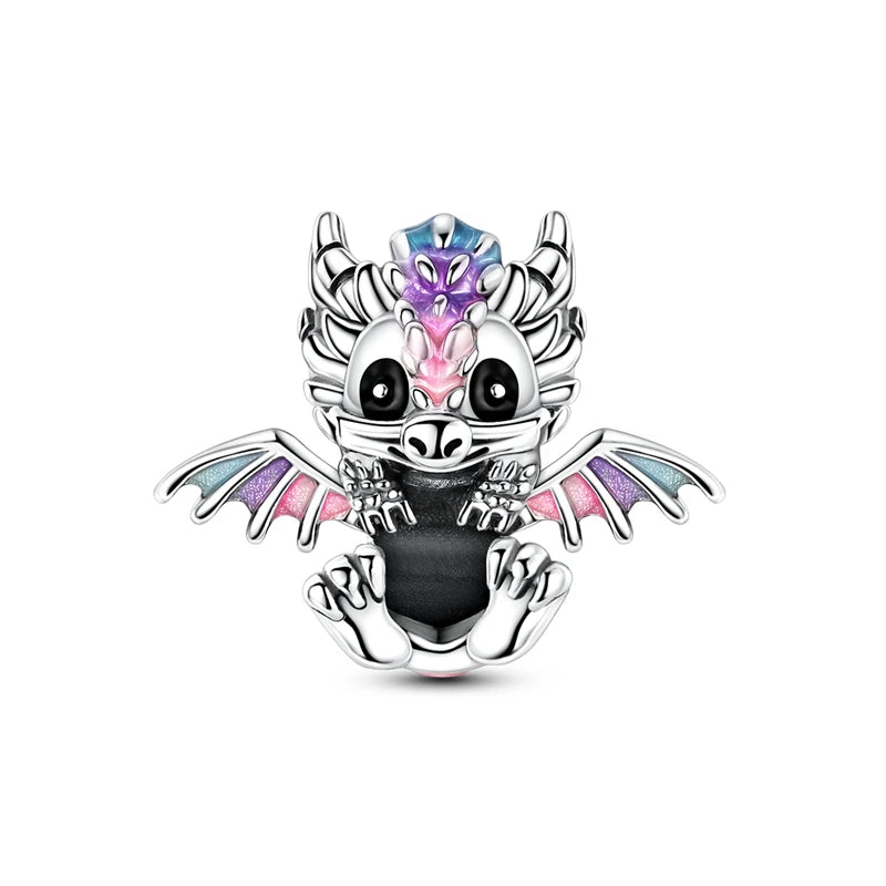 A silver heart charm bead featuring a dragon head design with iridescent pink and purple accents.