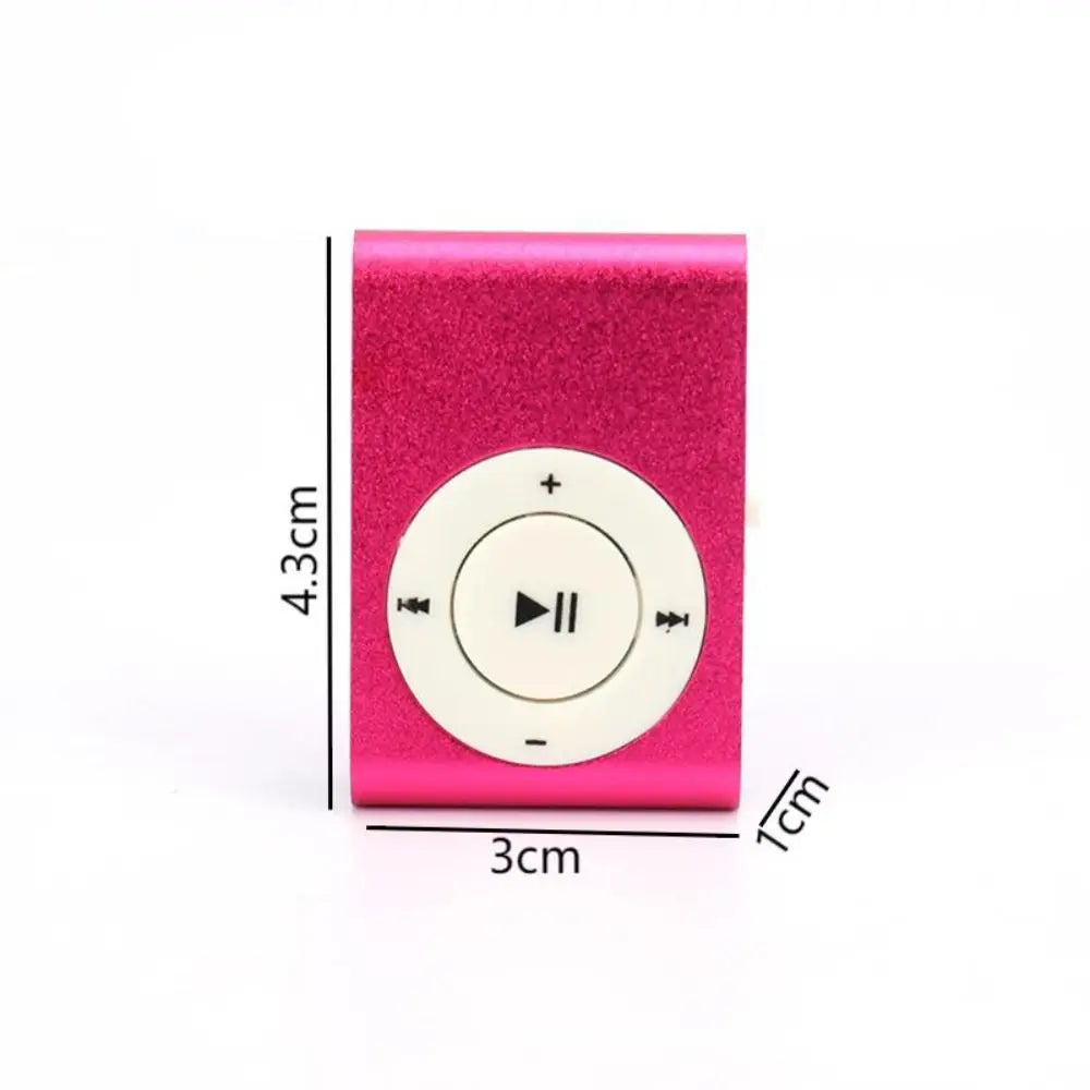 A pink portable mini MP3 player with a circular control button and volume icons.