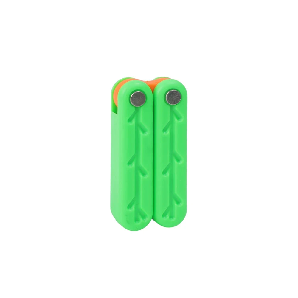 A pair of green butterfly-shaped fidget knives with orange accents.